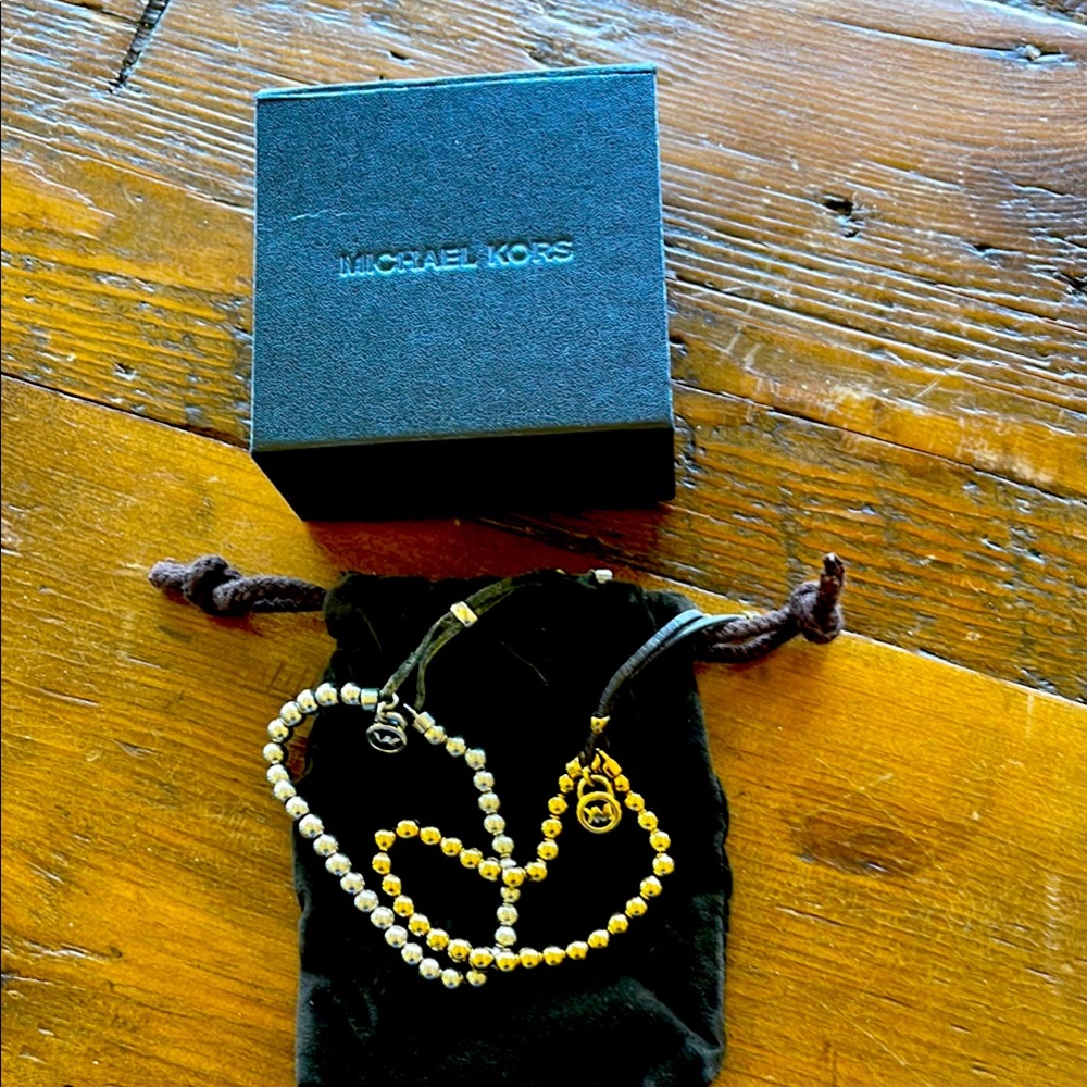Michael Kors Gold and Silver Women's Bracelets  used condition